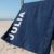 S&LT Strandtuch mit Name - personalisierte Bedrucking - XXL Saunatuch - Strandtuch 100x200 aus Baumwolle (Dunkelblau) - 1